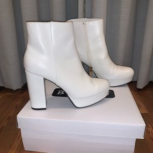 White booties. Never worn. Size 8. Love them but they don’t fit me 😥